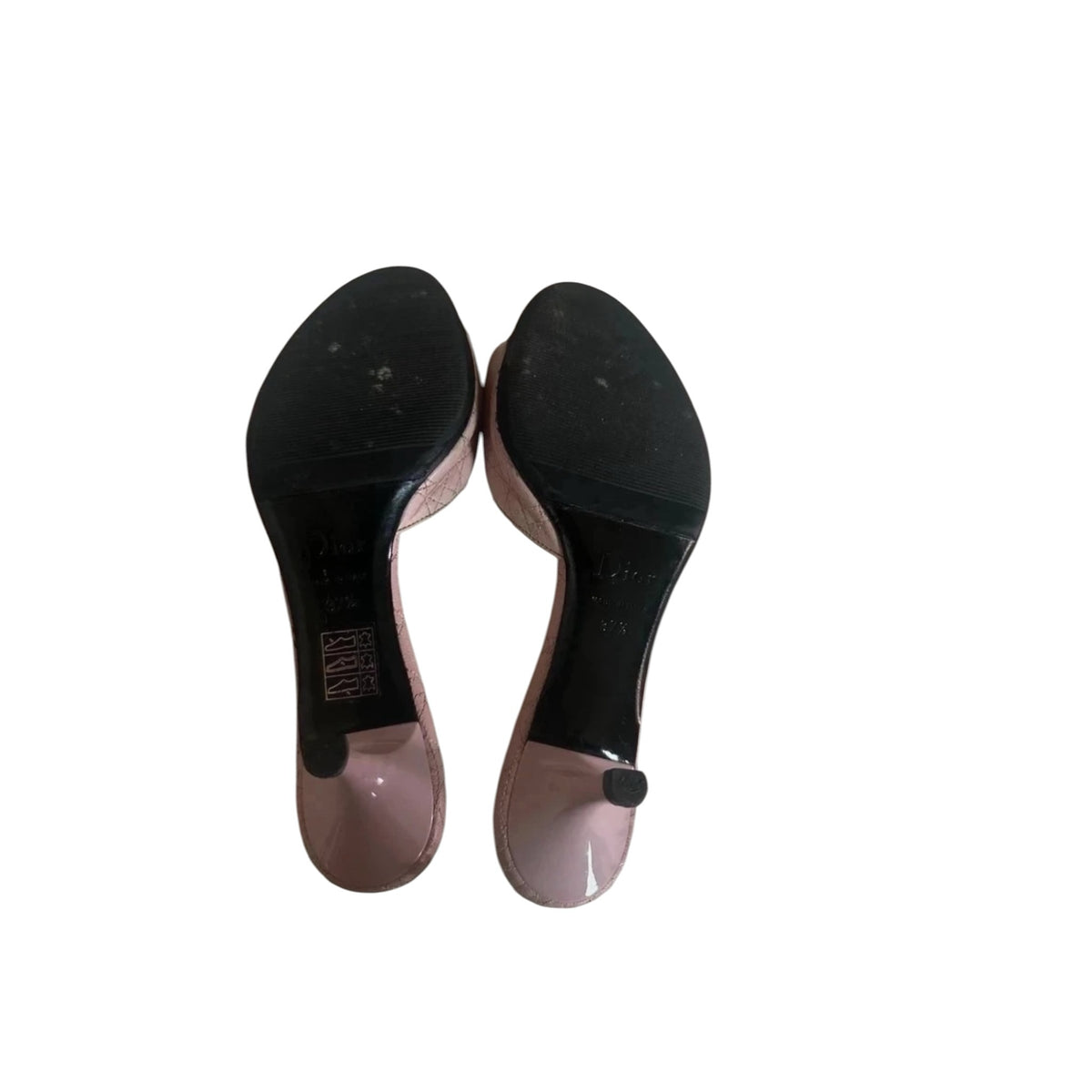 Fivedotsvintage Christian Dior pastel pink quilted leather high heel mules showing the black soles and stiletto heels