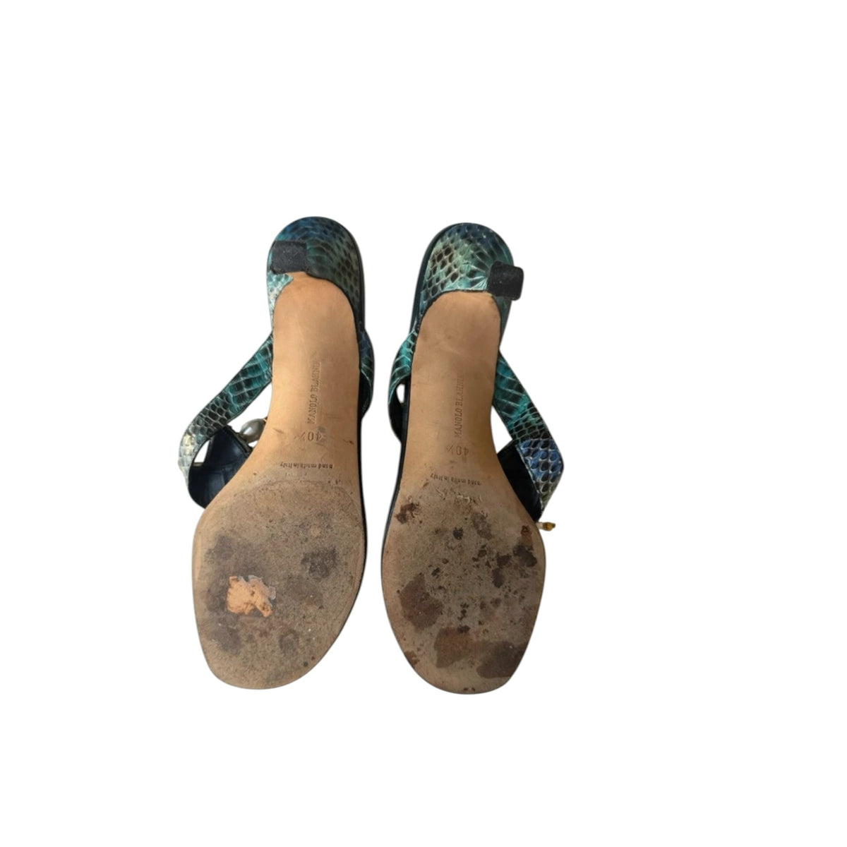Fivedotsvintage Manolo Blahnik teal and black snakeskin kitten heel thong sandals, showing the worn leather soles.