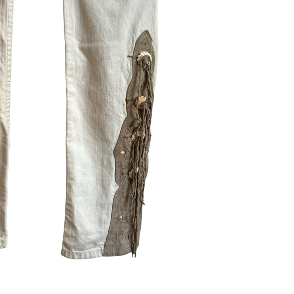 Fivedotsvintage Ralph Lauren cream cotton trousers with tan suede laser-cut overlays, fringe, and decorative buttons.