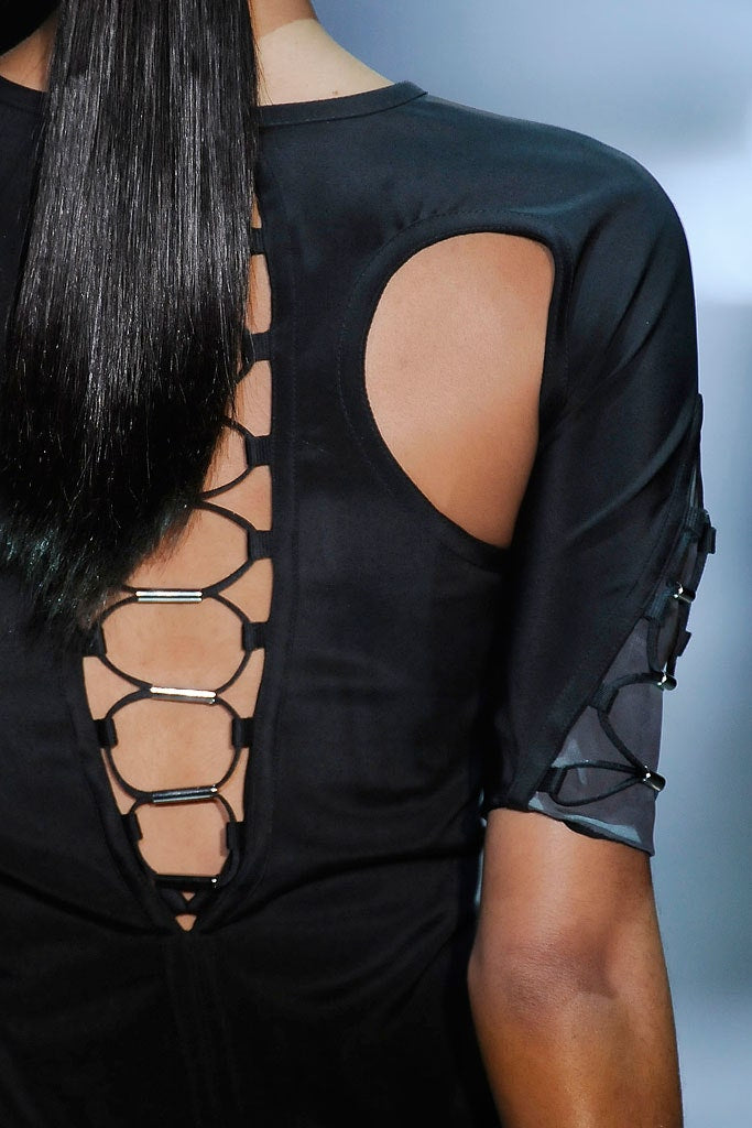 Gucci Spring/Summer 2010 by Frida Giannini
Black & Grey Silk-Blend Cut-Out Lace-Up Futuristic Mini Dress