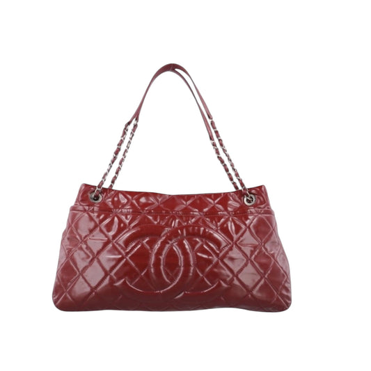 Chanel Timeless CC Soft Quilted
Leather Shopping Tote Bag in red patent leather with silver-tone hardware
