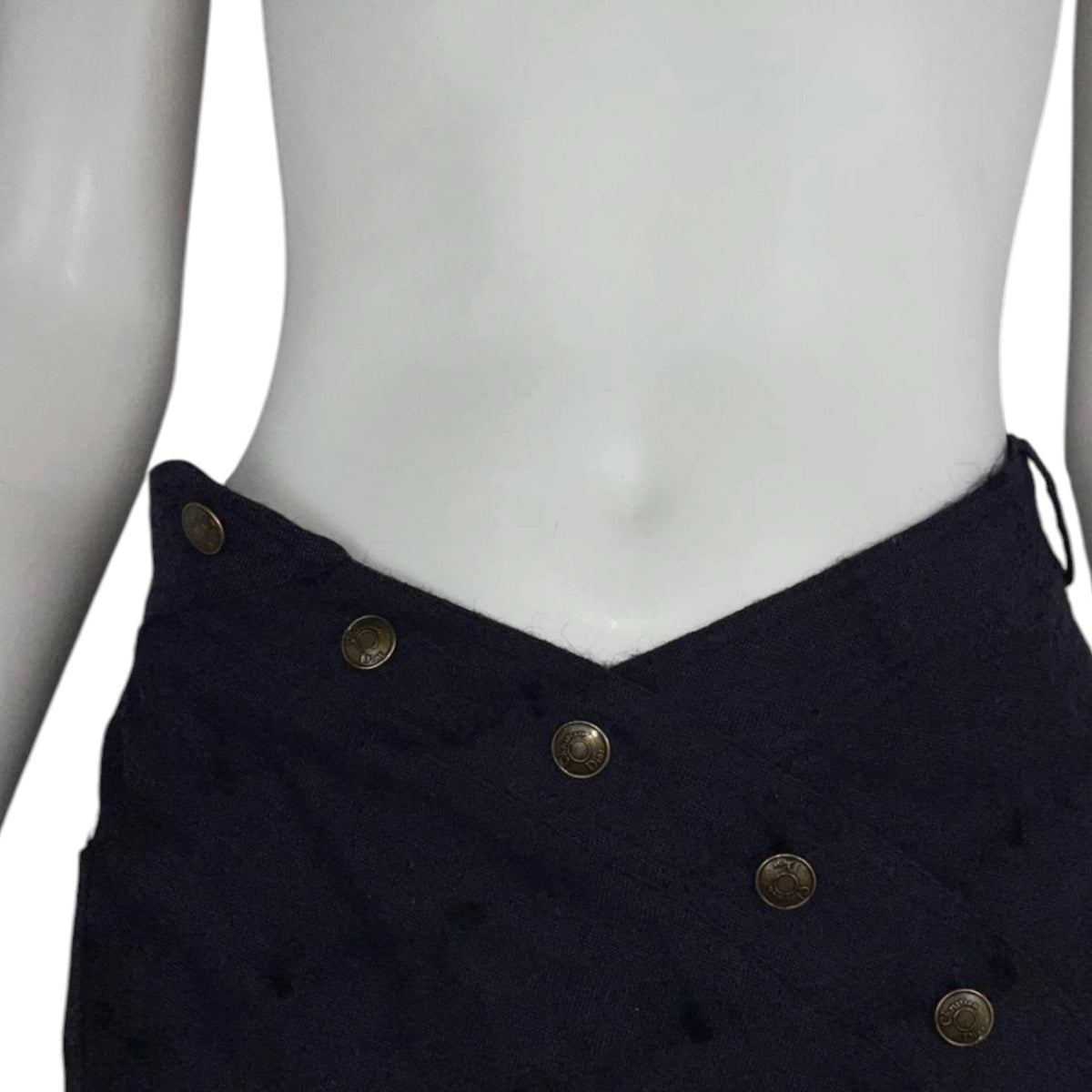 Fivedotsvintage black Christian Dior midi skirt with asymmetrical wrap design and branded metallic buttons