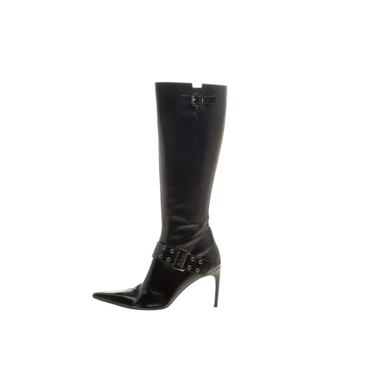 Fivedotsvintage black leather knee-high boots with pointed toe, stiletto heel, and metallic buckle strap detail.