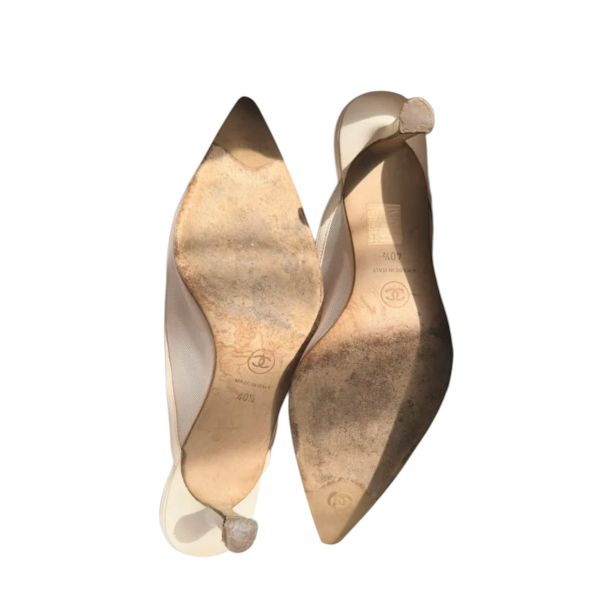 Fivedotsvintage CHANEL beige pointed toe mules showing the worn leather soles and kitten heels