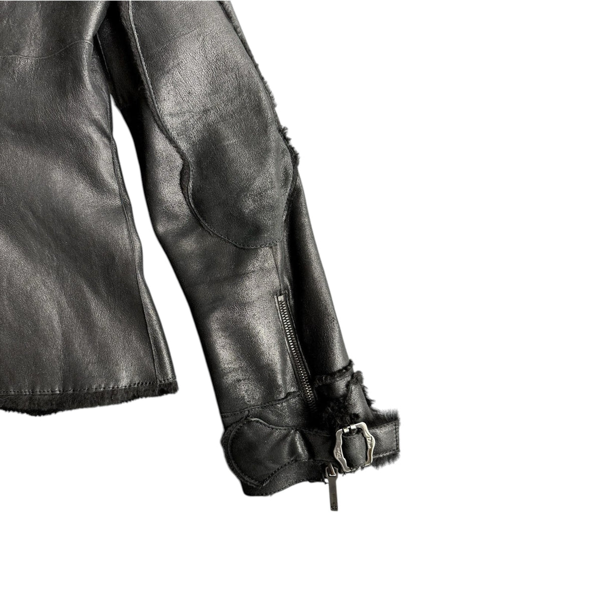 Fivedotsvintage Christian Dior Boutique black leather jacket sleeve with fur lining, silver zipper and buckle detail.