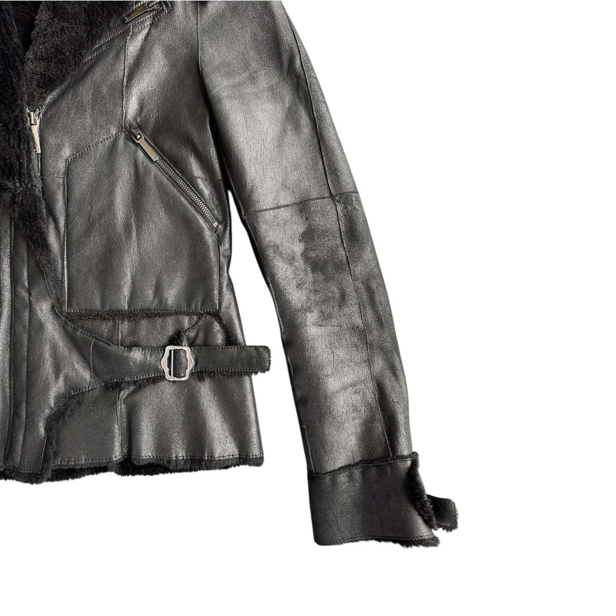 Fivedotsvintage Christian Dior Boutique black leather jacket with fur lining, silver hardware, and waist buckle.