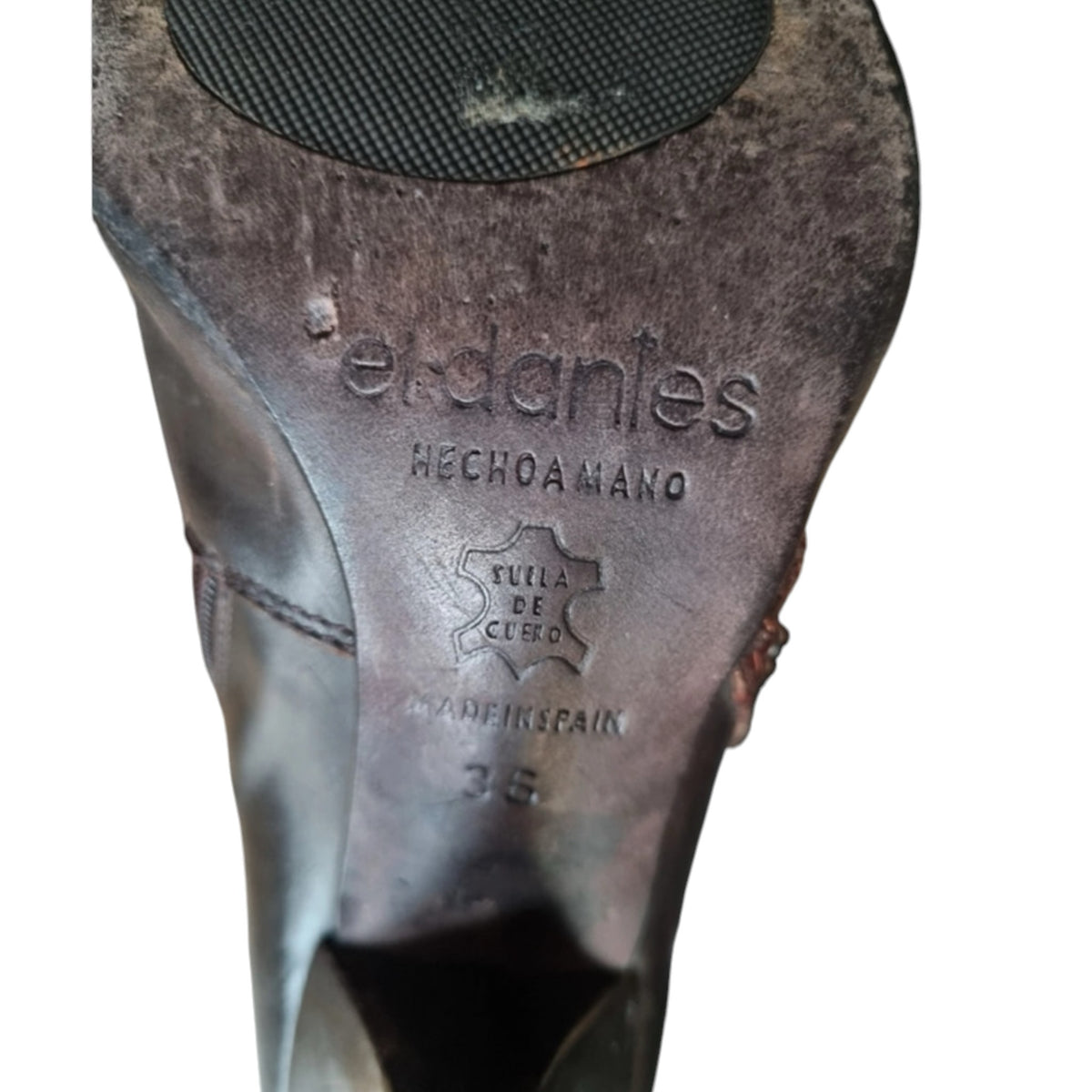 Fivedotsvintage el dantes dark leather high heel boot sole with embossed Spanish craftsmanship details