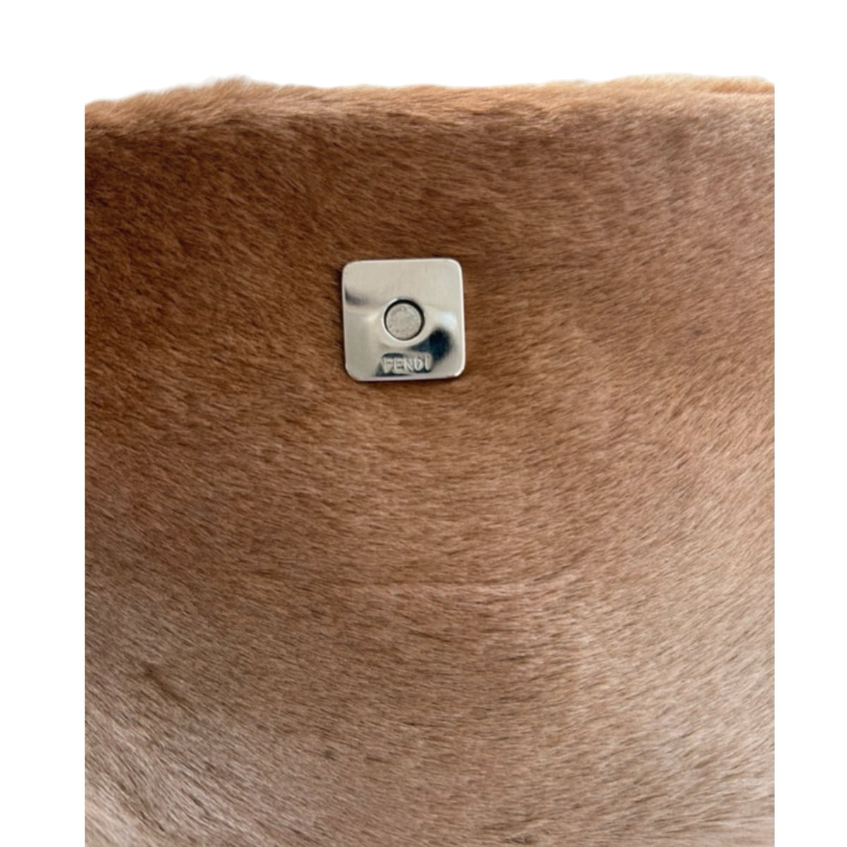 Fivedotsvintage Fendi shoulder bag featuring soft beige fur texture and a silver logo-embossed hardware closure.