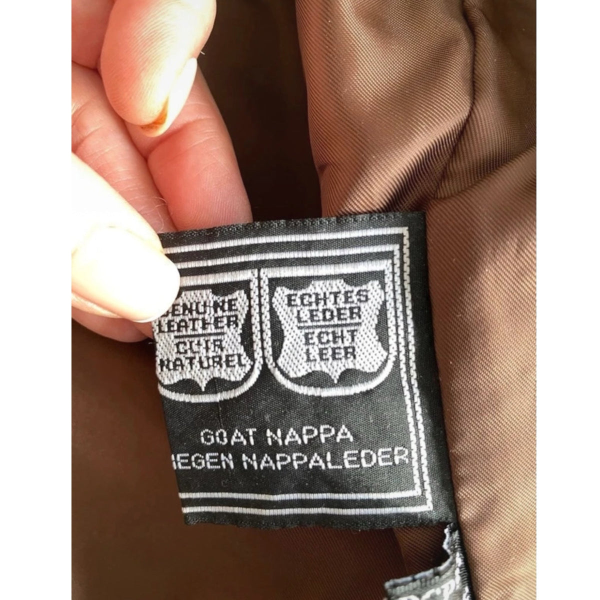 Fivedotsvintage genuine goat nappa leather jacket label showing material authenticity in brown lining