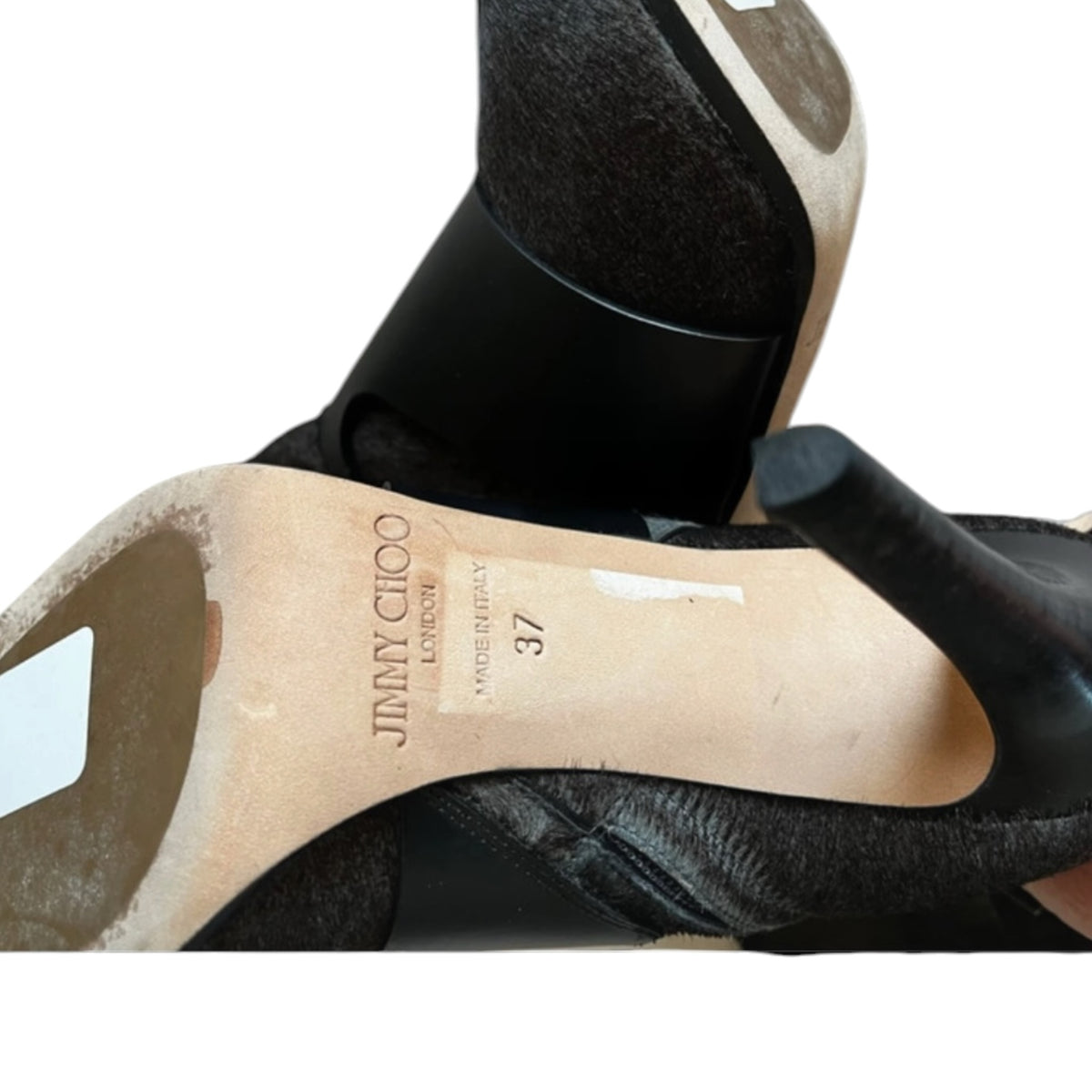 Fivedotsvintage Jimmy Choo knee high stiletto boots showing the branded leather sole and textured hair-on-hide finish