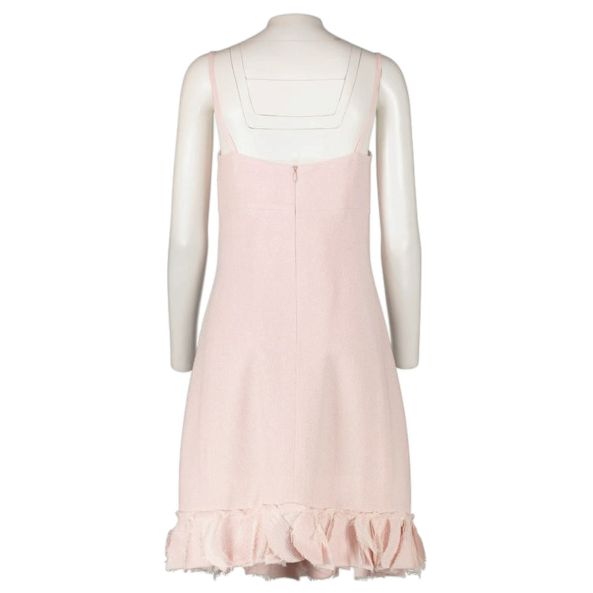 Fivedotsvintage pastel pink Chanel tweed mini dress with spaghetti straps and a ruffled hem, back view.