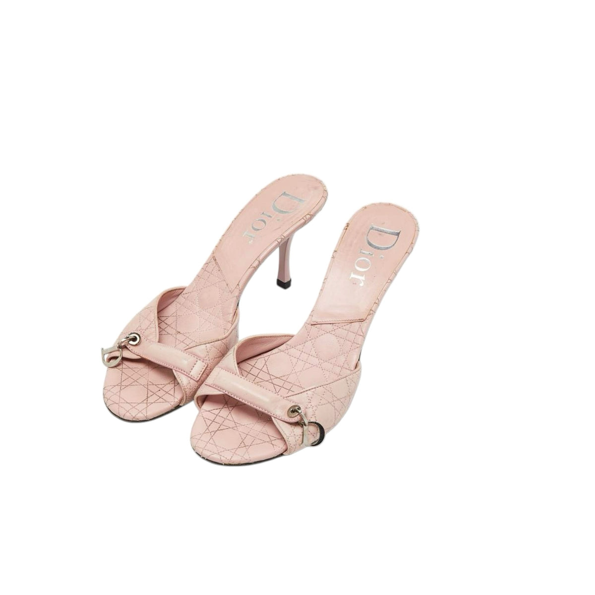 Fivedotsvintage pastel pink quilted leather Christian Dior high heel mules with signature metallic charm detail.