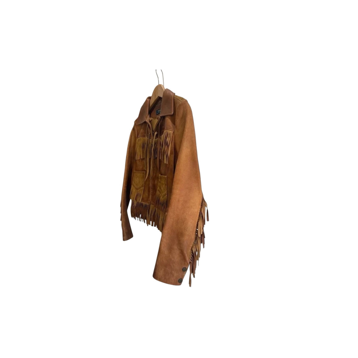 Fivedotsvintage Polo Ralph Lauren tan suede fringe jacket with zip front and bohemian detailing on a wooden hanger
