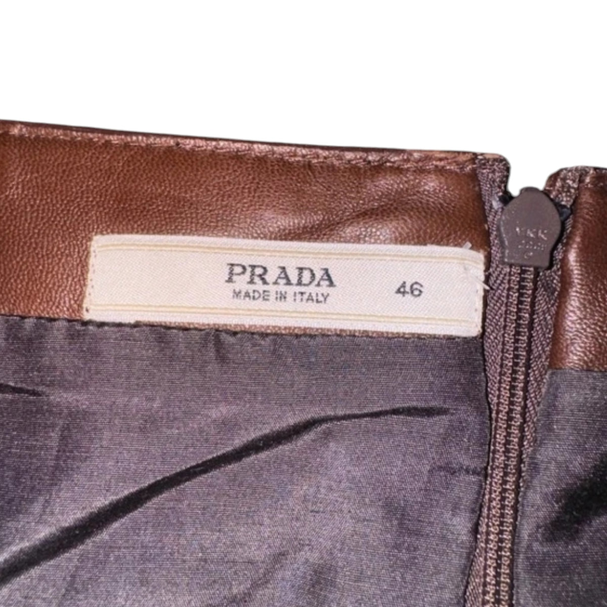 Fivedotsvintage Prada brown leather mini skirt interior label and size 46 tag with back zipper detail