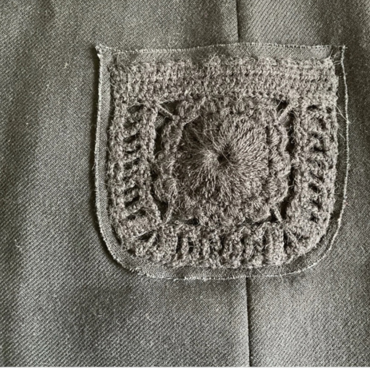 Fivedotsvintage Prada charcoal wool mini skirt featuring a detailed hand-finished crochet patch pocket