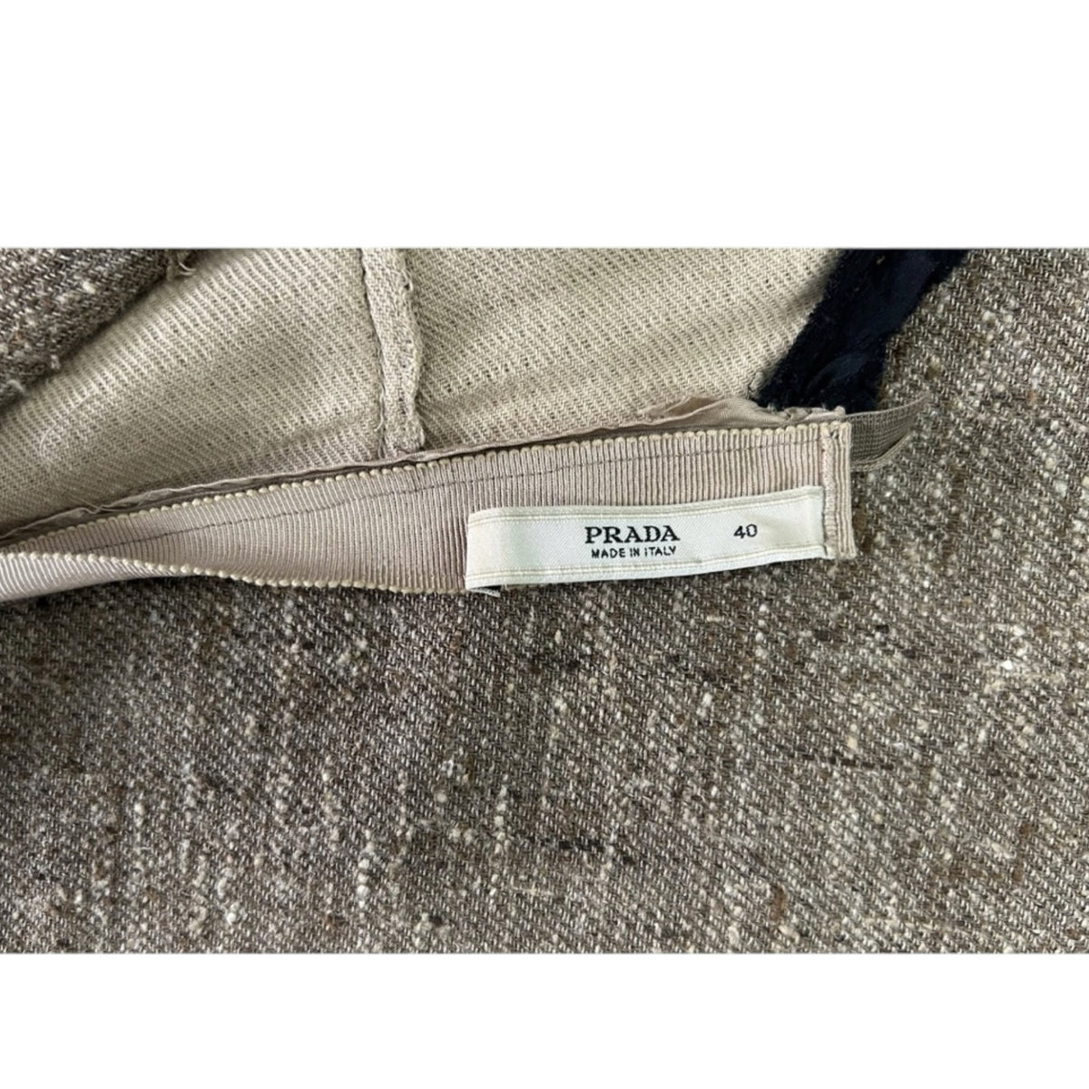 Fivedotsvintage Prada sleeveless wool shift dress interior label showing size 40 and Italian craftsmanship