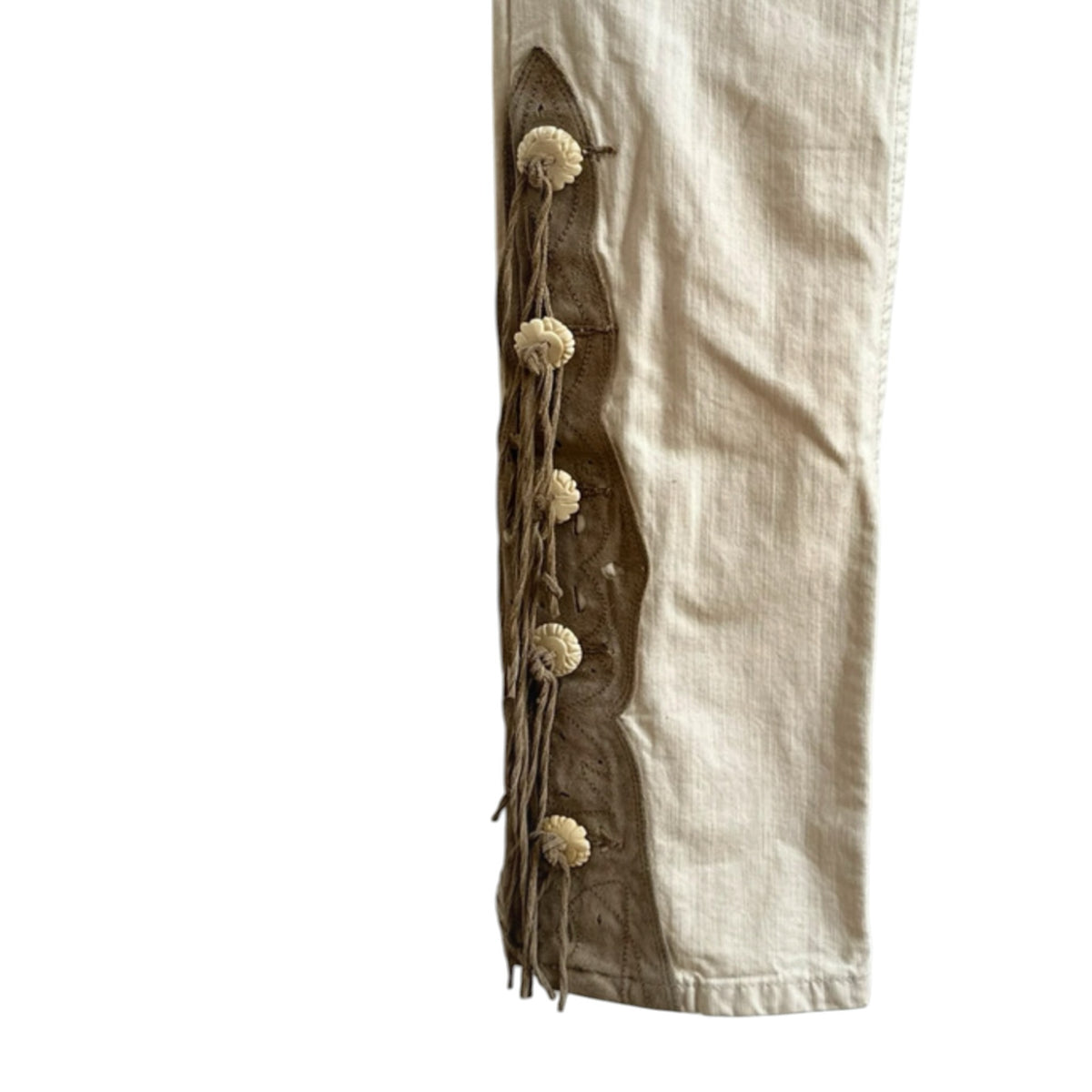 Fivedotsvintage Ralph Lauren cream cotton trousers with tan suede laser-cut overlays, fringe, and decorative buttons.