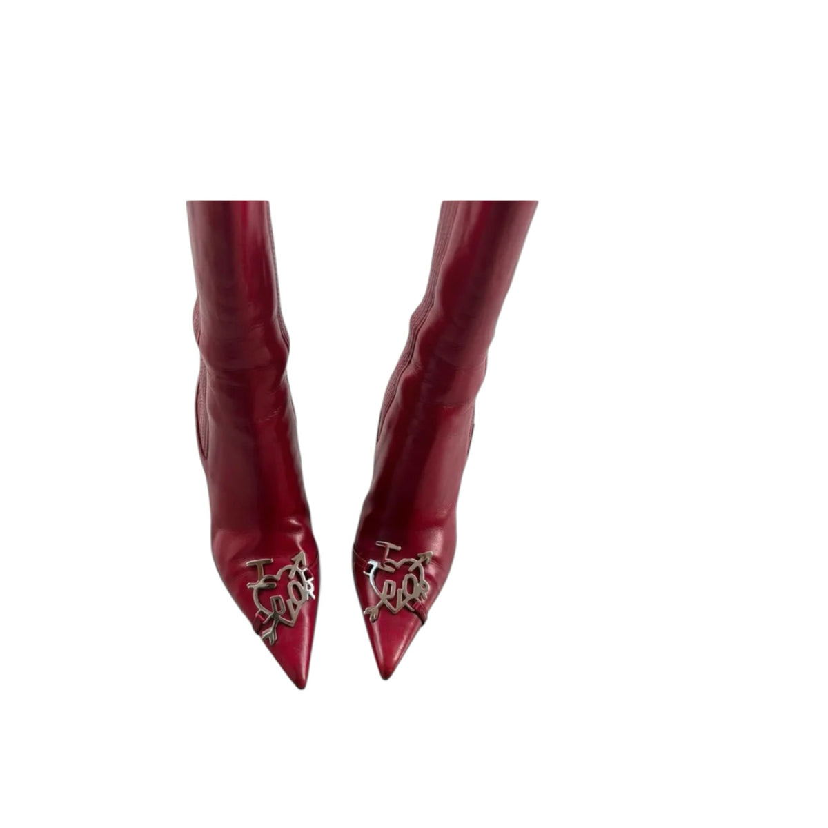 Fivedotsvintage red leather stiletto ankle boots with pointed toes and metallic heart-shaped Dior logo emblems.