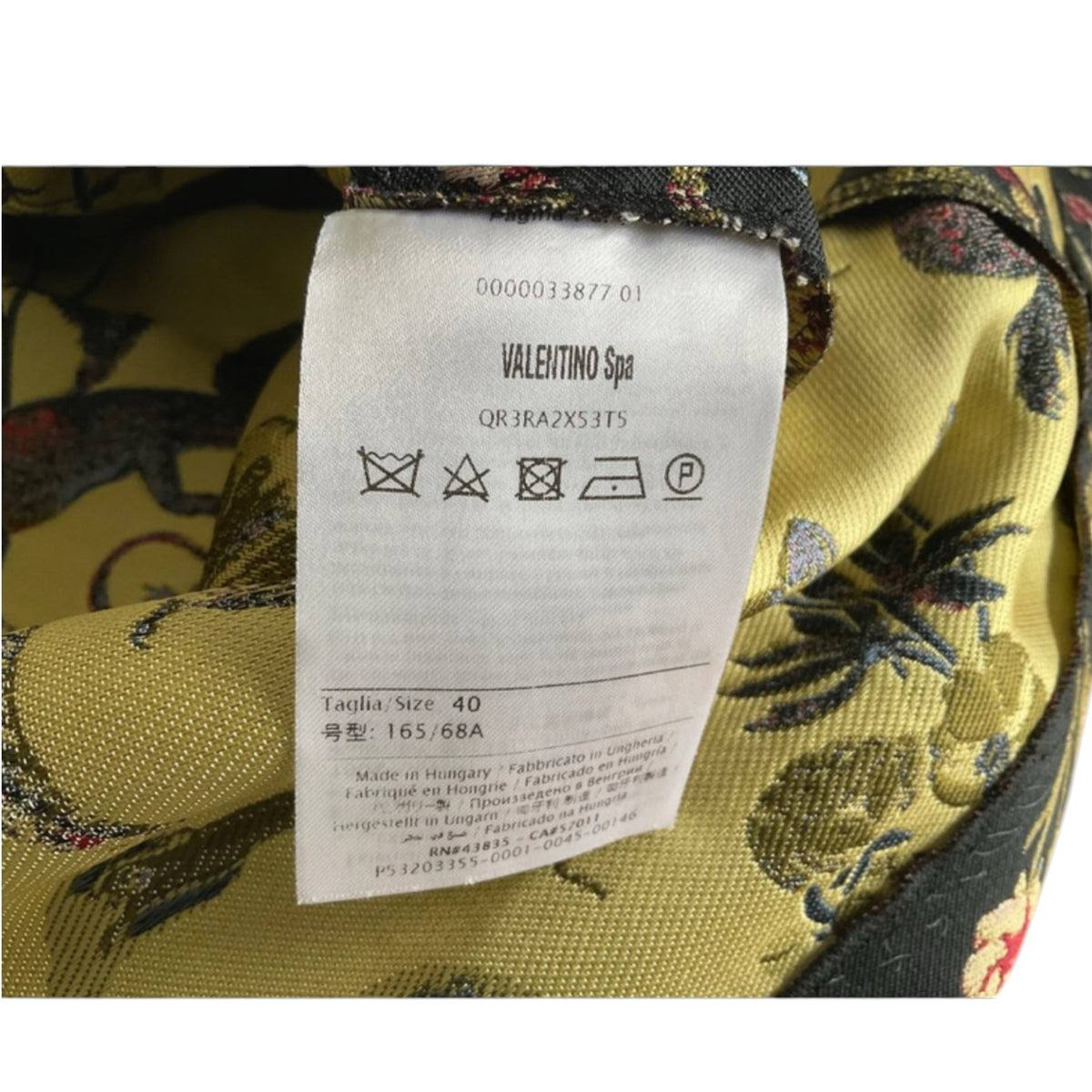 Fivedotsvintage RED Valentino mini skirt care label with size 40 and floral jacquard fabric detail