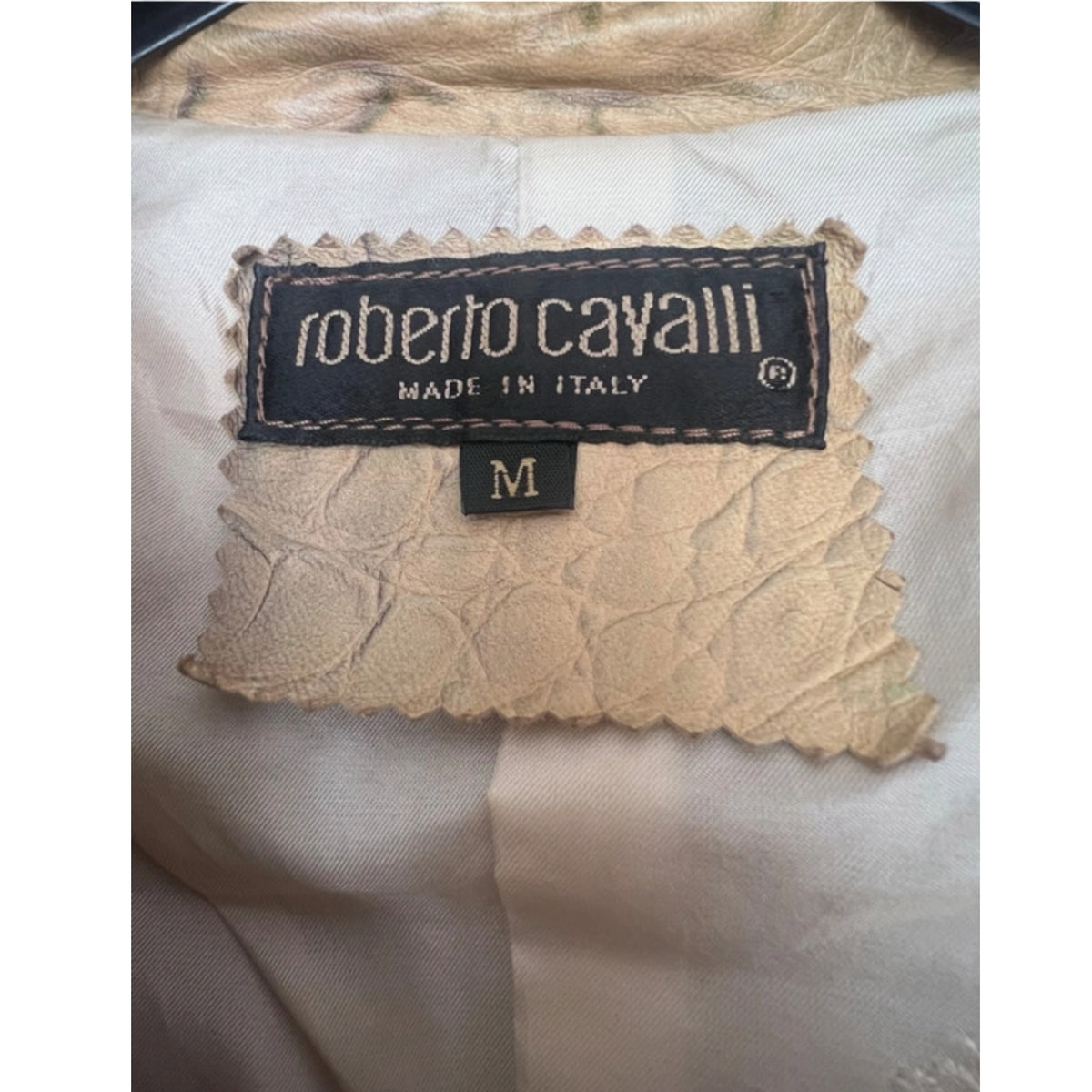Fivedotsvintage Roberto Cavalli jacket label showing size M and Italian craftsmanship on textured leather