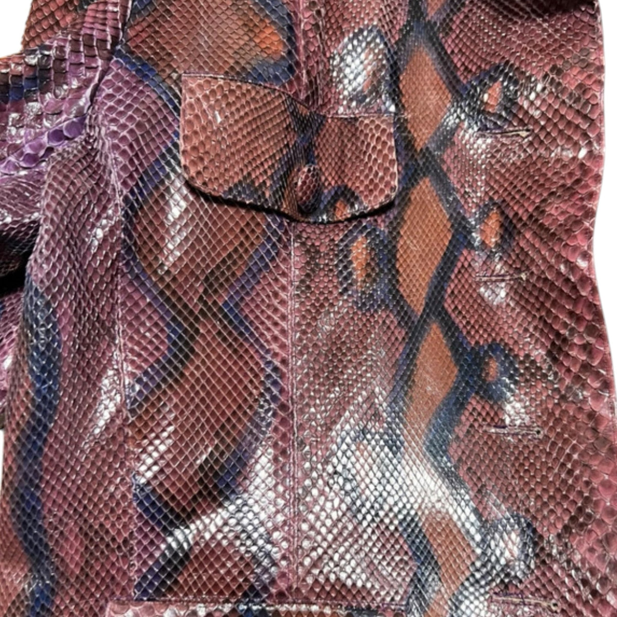 Fivedotsvintage SAINT LAURENT Rive Gauche python skin jacket in purple, brown, and blue with button-front detail.
