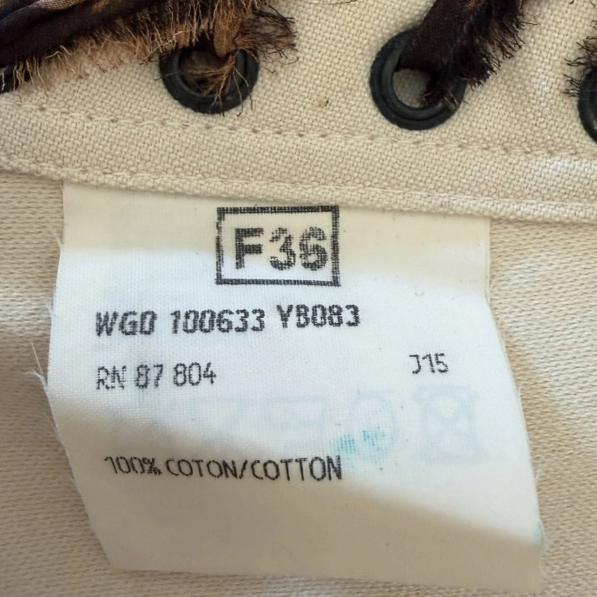 Fivedotsvintage Yves Saint Laurent Rive Gauche skirt care label showing 100% cotton material and size F36