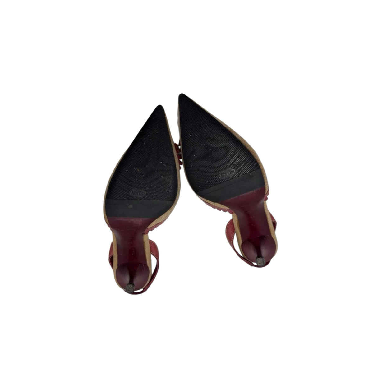 Fivedotsvintage Yves Saint Laurent slingback heels showing the black Vibram soles and red kitten heels
